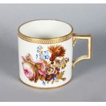 A GOOD MEISSEN COFFEE CAN, white ground and edged in gilt and painted with flowers, crossed swords