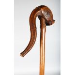 AN EARLY 20TH CENTURY AFRICAN WALING STICK, POSSIBLY ETHIOPIAN, finely carved.