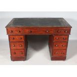 A SMALL VICTORIAN MAHOGANY PEDESTAL DESK, with leather inset top, three frieze drawers, three