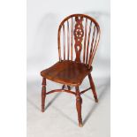A SINGLE WINDSOR CHAIR with star back and cow horn stretcher.
