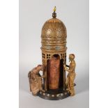 A COLD CAST PAINTED BRONZE ARABIC TOWER with two men and sliding front opening to reveal a nude.