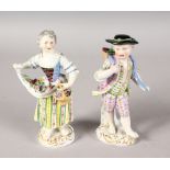 A GOOD PAIR OF 19TH CENTURY MEISSEN FIGURES OF A YOUNG BOY AND GIRL carrying grapes and flowers.
