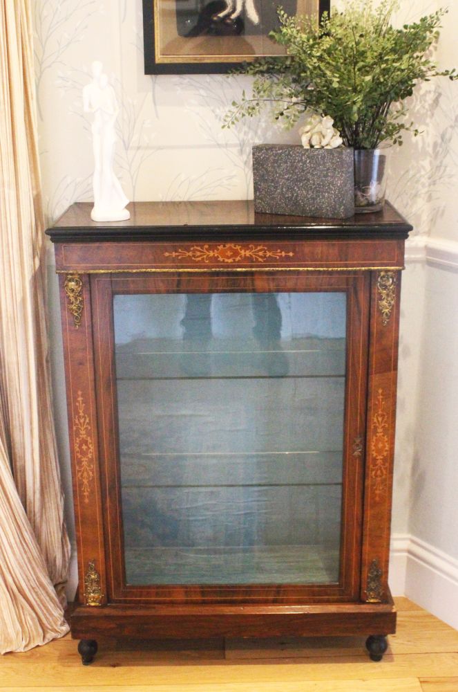 A VICTORIAN WALNUT AND MARQUETRY INLAID PIER CABINET, with a single glazed door on a plinth base