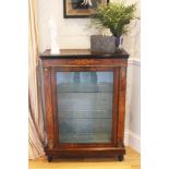 A VICTORIAN WALNUT AND MARQUETRY INLAID PIER CABINET, with a single glazed door on a plinth base