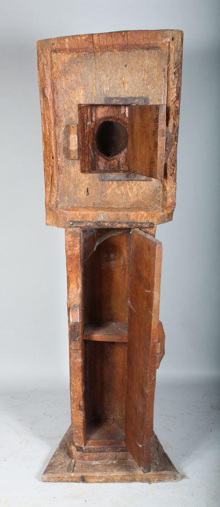 CARVED OUT OF THE SOLID. AN UNUSUAL TALL STANDING CUPBOARD, with two panel doors. 6ft high x 1ft - Image 3 of 3