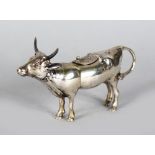 A COW CREAMER. 5.5ins long. .835 silver stamp.