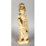 A JAPANESE CARVED IVORY FIGURE OF A GEISHA. 11ins high.