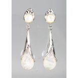 A PAIR OF SILVER AND MOTHER-OF-PEARL DROP EARRINGS.