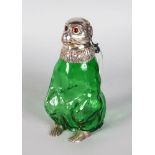 A GREEN MONKEY CLARET JUG with plated head and feet. 7.5ins high.