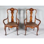A PAIR OF 18TH CENTURY DUTCH MARQUETRY ARMCHAIRS, with drop-in seats, serpentine fronts, on cabriole