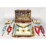 MASONIC REGALIA, in a leather case with gongs, apron and arm bands from CHRISTOPHER LEATHER DALE