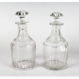 A GOOD PAIR OF SQUARE CUT DECANTERS AND STOPPERS.