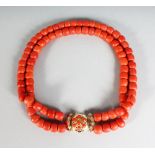 A VERY GOOD DOUBLE ROW CORAL NECKLACE with gold clasp, 193gms.