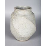 A LARGE OXIDISED STUDIO POTTERY VASE by CHRISTOPHER JAMES CARTER, CIRCA. 1991, of twisted ovoid