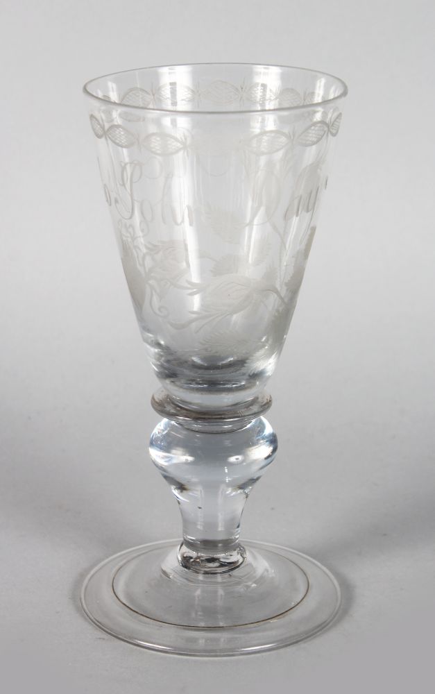 AN EARLY ENGLISH ALE GLASS, engraved "Success to John Day", with fruiting vines and knop stem.