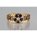 A 9CT GOLD, DIAMOND AND SAPPHIRE RING.