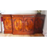 A GOOD GEORGE III DESIGN MAHOGANY BREAKFRONT SIDEBOARD, with blind fretwork drawers above four