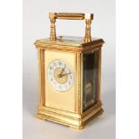 A GOOD 19TH CENTURY FRENCH BRASS REPEATER CARRIAGE CLOCK with silvered dial. 5.5ins high.