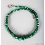 A MALACHITE NECKLACE.