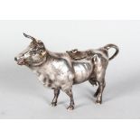 A VICTORIAN COW CREAMER. 7ins long. London. Victorian Import Marks.