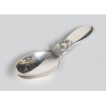 A GEORG JENSEN STERLING DANISH SILVER "CACTUS" PATTERN CADDY SPOON.