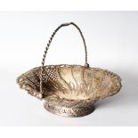 A GEORGE III OVAL PIERCED FRUIT BASKET with swing rope handle.