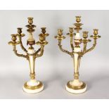 A VERY GOOD PAIR OF LOUIS XVI ORMOLU AND WHITE MARBLE FOUR BRANCH CANDELABRA, with acanthus