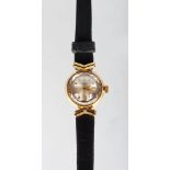 A LADIES TUDOR GOLD WRISTWATCH with leather strap.