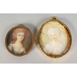 AN 18TH CENTURY OVAL PORTRAIT MINIATURE of a lady in a white dress; together with another of a young