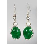 A PAIR OF SILVER AND JADE EARRINGS.