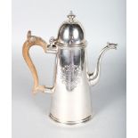 A SUPERB GEORGE I TAPERING COFFEE POT AND COVER with wooden handle. Large crest. London 1723. Maker;