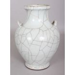 A CHINESE GE STYLE CRACKLEGLAZE PORCELAIN VASE, the shoulders moulded with two lug handles, 7.2in