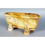 A SUPERB ITALIAN CARVED SIENNA MARBLE MINIATURE BATH, with moulded top, lion mask, supported on four