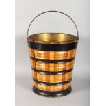 A DUTCH WOODEN BUCKET with brass liner and handle.