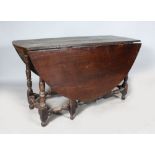 AN 18TH CENTURY OAK OVAL DROP FLAP GATE-LEG DINING TABLE. 4ft 10ins wide x 4ft 5ins deep.