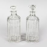 A GOOD PAIR OF SQUARE CUT DECANTERS AND STOPPERS.