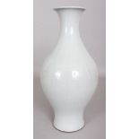 A CHINESE RU STYLE CRACKLEGLAZE PORCELAIN BALUSTER VASE, the base with a Qianlong seal mark, 12.