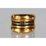 AN 18CT GOLD, DIAMOND AND SAPPHIRE RING.