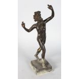 AFTER THE ANTIQUE THE DANCING FAUN OF THE VATICAN, on a square base. 12ins high.