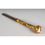 A SUPERB VICTORIAN GOLD AND BLUE ENAMEL PAPER KNIFE, with wooden blade, the handle with blue