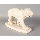 AN ART DECO STYLE POTTERY TIGER. 15ins long.