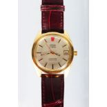 A GENTLEMAN'S 18CT GOLD OMEGA ELECTRONIC F300HZ SEAMASTER WRISTWATCH with leather strap.