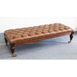 A GOOD LONG GEORGIAN DESIGN STOOL, with studded leather top, studded brass and reeded sides, on