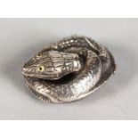 A NOVELTY SILVER SNAKE VESTA.