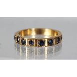 A GOLD HALF ETERNITY RING.