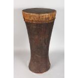 AN AFRICAN DRUM. 22ins high.