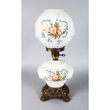 A MILK GLASS OIL LAMP painted with flowers. 21ins high.