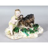 A GOOD MEISSEN GROUP, CUPID WITH A GOAT, on a fruiting vine base. Incised No. A90. 9ins long x
