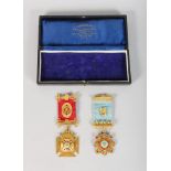 A 9CT GOLD MASONIC BADGE, SIR CHRISTOPHER LODGE 307, and another in silver gilt and enamel.