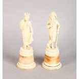 A GOOD PAIR OF 19TH CENTURY FRENCH IVORY FIGURES OF A GALLANT AND LADY, the man with walking